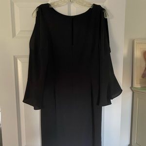 Beautiful black pea in the pod maternity evening dress or even for the office.